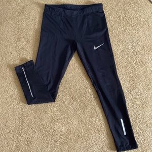 NIKE unisex compression leggings. Size kids large